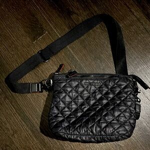 MZ Wallace black quilted crossbody bag.